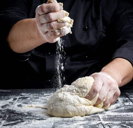 Kneading raw yeast dough